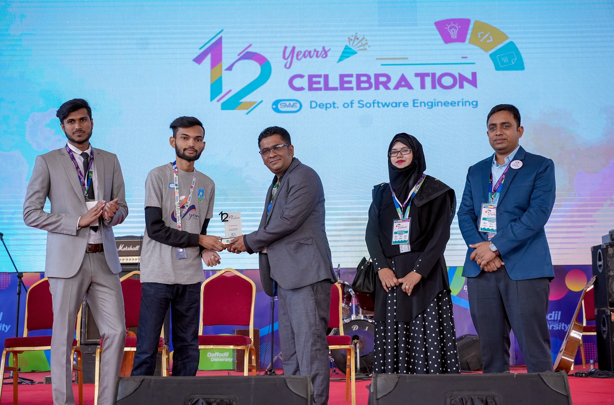 Receiving a prize on stage